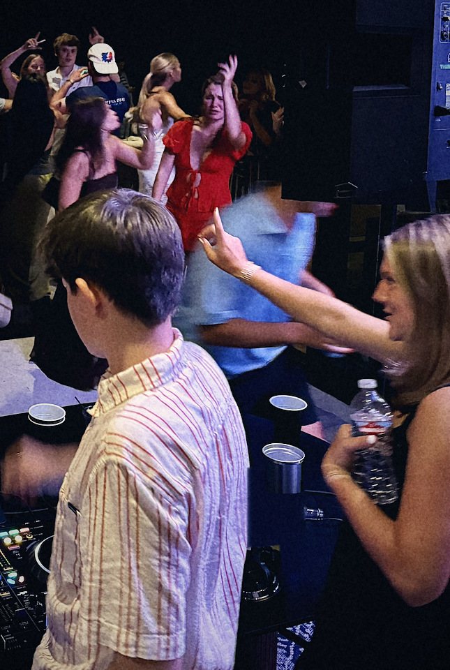 Henry at the decks with a packed crowd